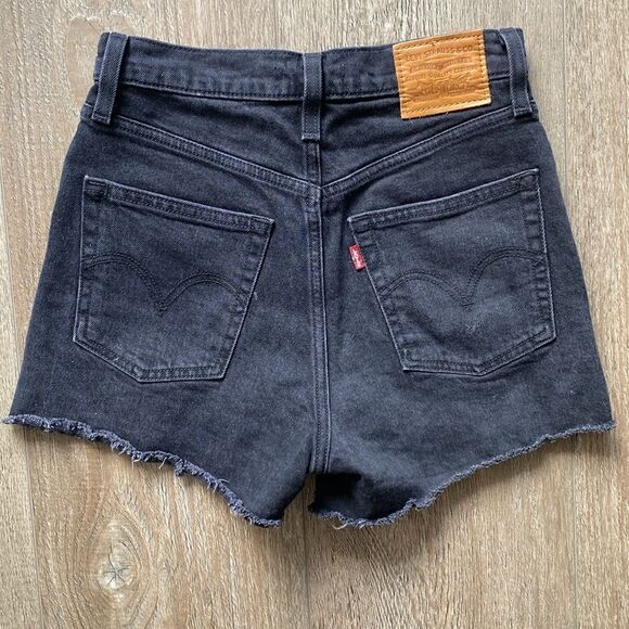 Levi’s Ribcage High Waisted Cutoff Shorts in Black Bayou Washed Black - Picture 4 of 5